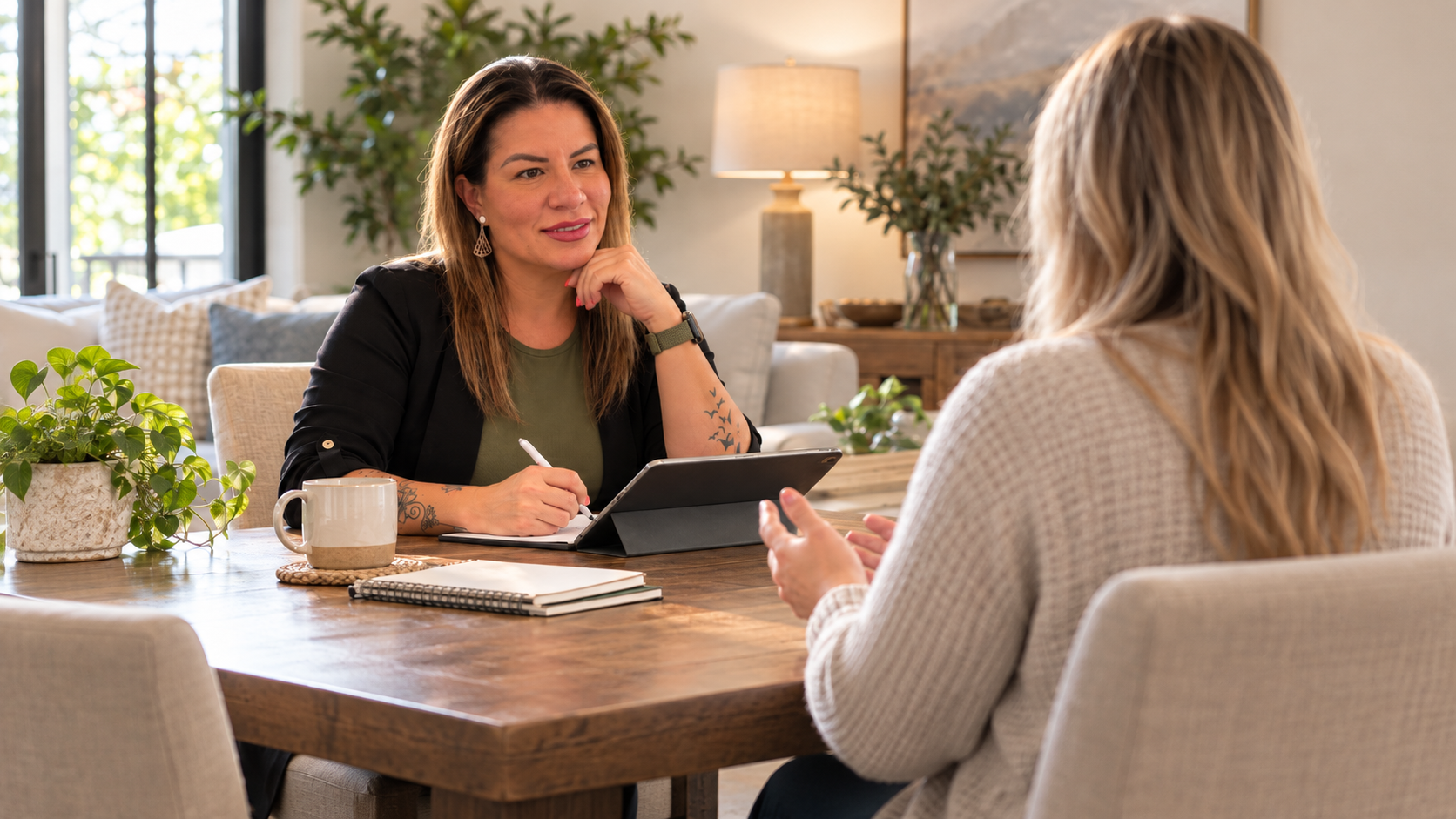 Illustration of a nurse practitioner discussing care with a patient in a home setting.